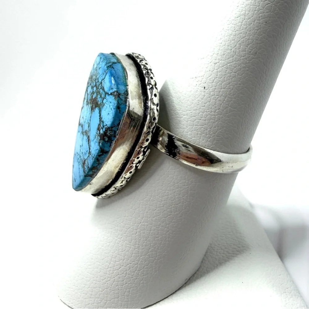 Turquoise gemstone, silver overlay ring stamped 925‎  oval adjustable 5-8
